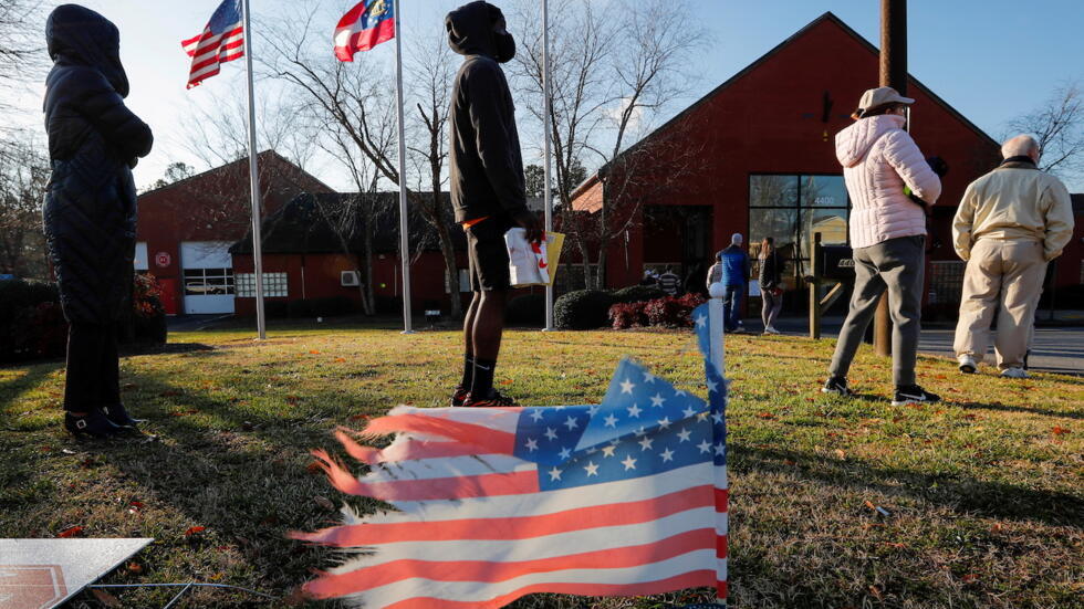 Democrats win crucial runoff Senate vote in take narrow lead